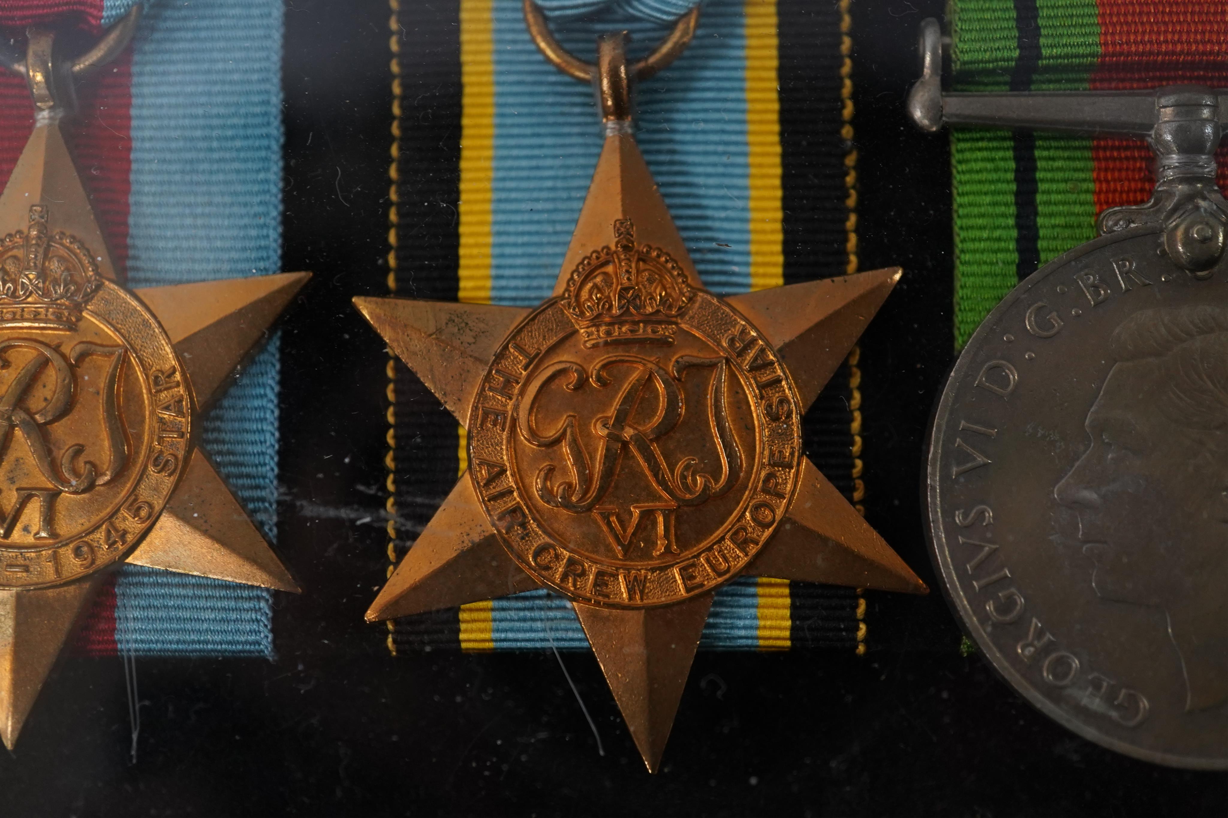 A framed WWII RAF medal group awarded to Wing Commander Brian Robert Noble, comprising;, The 1939-1945 Star, with clasp for the Battle of Britain, The Air Crew Europe Star, The Defence Medal, The British War Medal, The 1